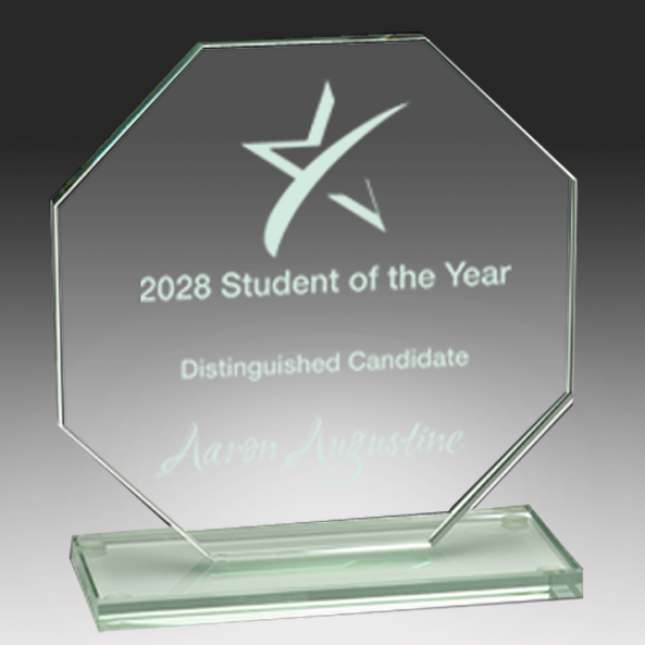 Glass award plaque for 2028 Student of the Year with engraved text on a gray background