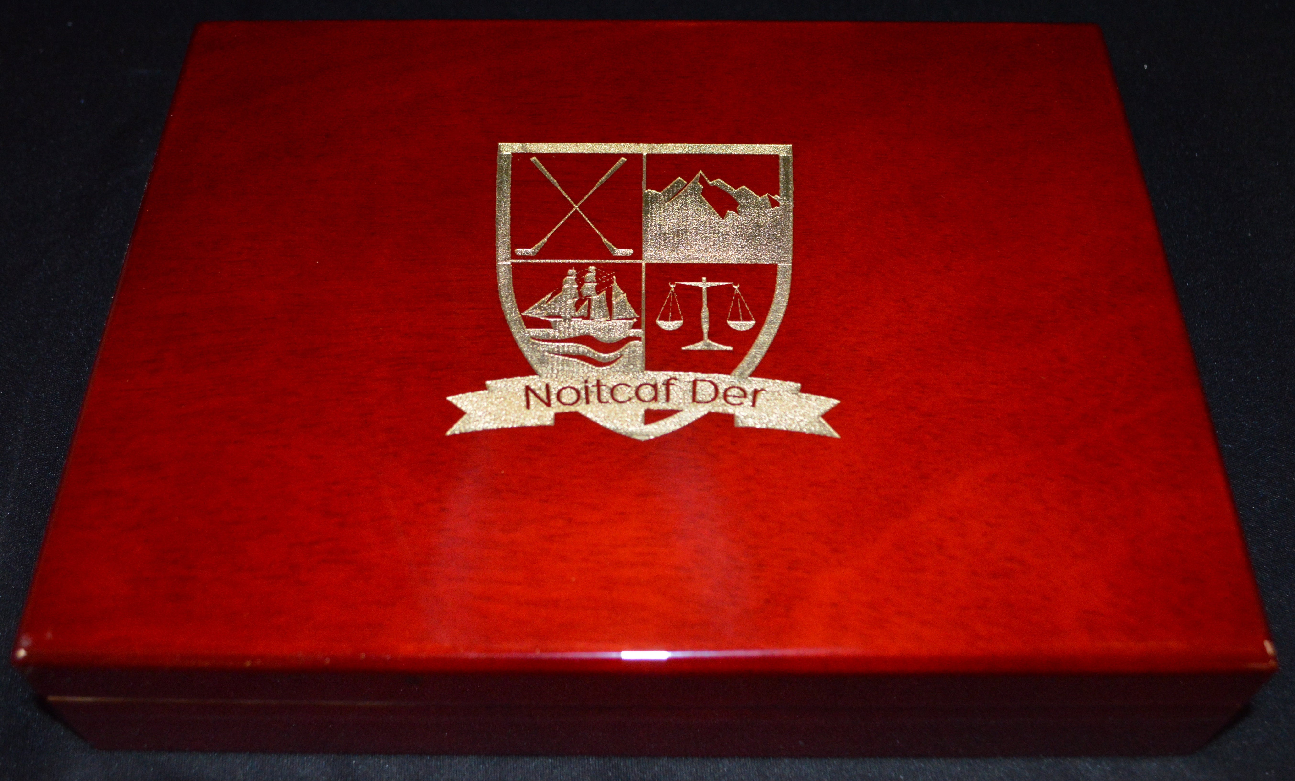 Red box with a logo and text on a dark background