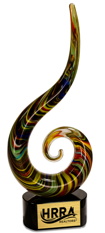 Colorful glass sculpture with 'HRRA REALTORS' logo on a black base. Langley AFB Virginia