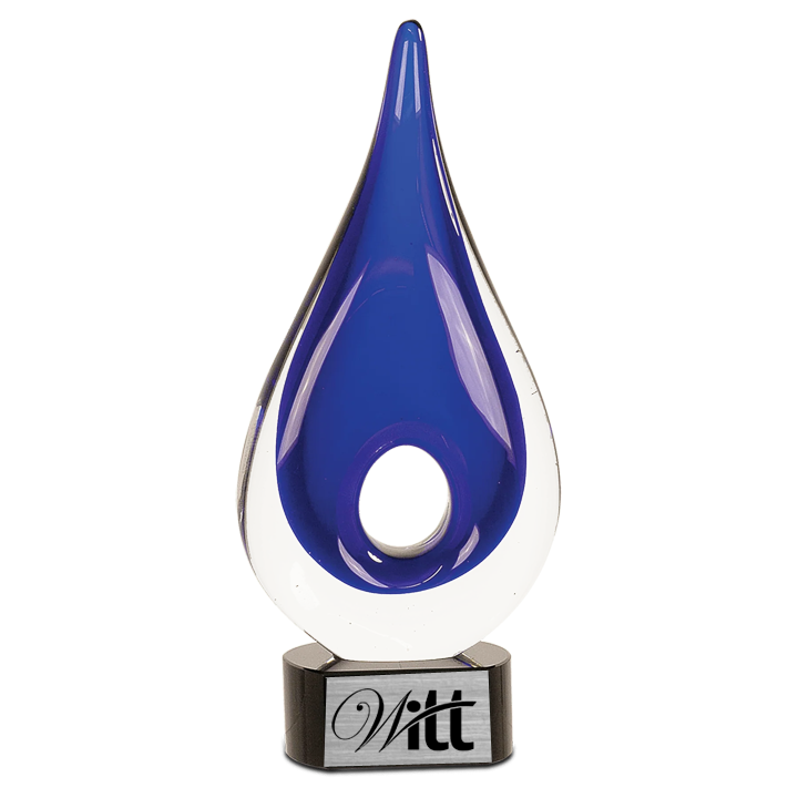 Teardrop-shaped glass award with blue interior and clear exterior, branded 'Witt'. Norfolk, VA