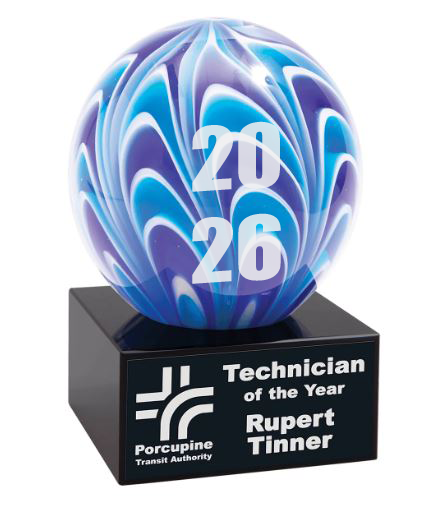 Blue and purple swirl trophy with '2026' on a black base, featuring the Porcupine Transit Authority logo. Baltimore, Maryland
