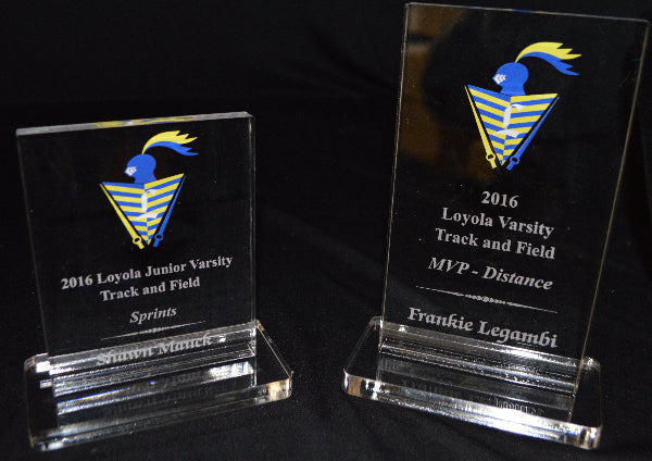 GROUP OF ACRYLIC AWARDS ON BASE