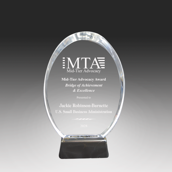 Clear Acrylic award with engraved text on a black stand against a gray background