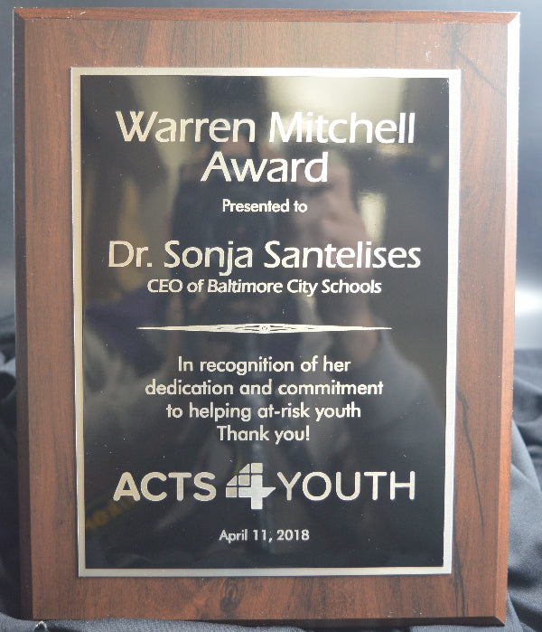 Plaque for Warren Mitchell Award presented to Dr. Sonja Santelises by ACTS 4 YOUTH