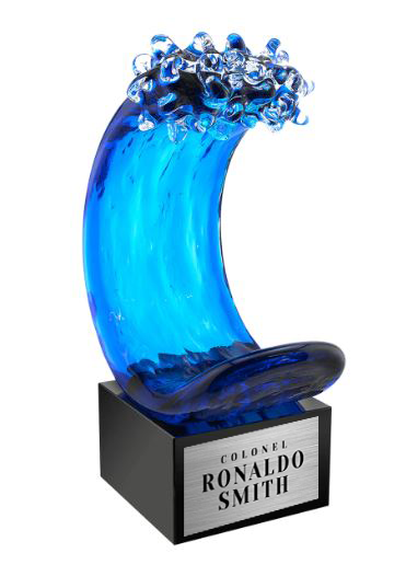 Blue glass wave sculpture on a black base with 'Colonel Ronaldo Smith' in Norfolk, Va