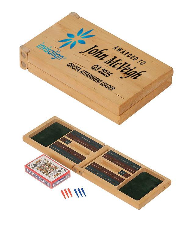 Wooden Cribbage board with cards and pegs on a white background in Hampton Roads Virginia