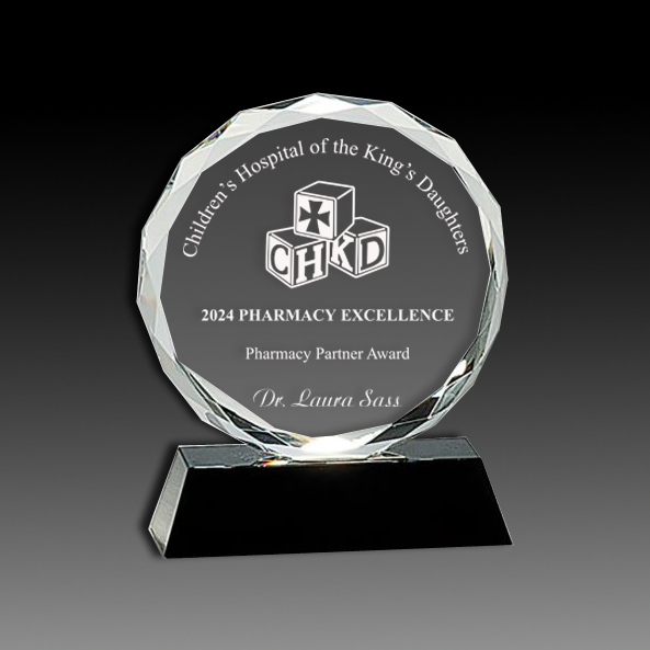 Round Facet Crystal on Black Pedestal Base