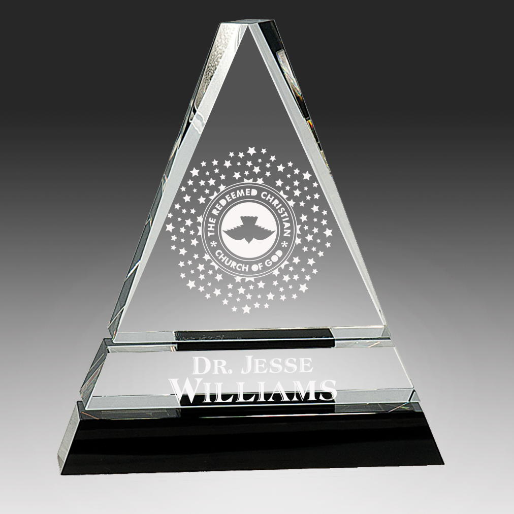 Triangular glass award with engraved text and logo on a black base in Norfolk, VA
