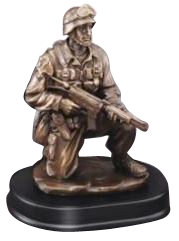 Soldier kneeling with rifle