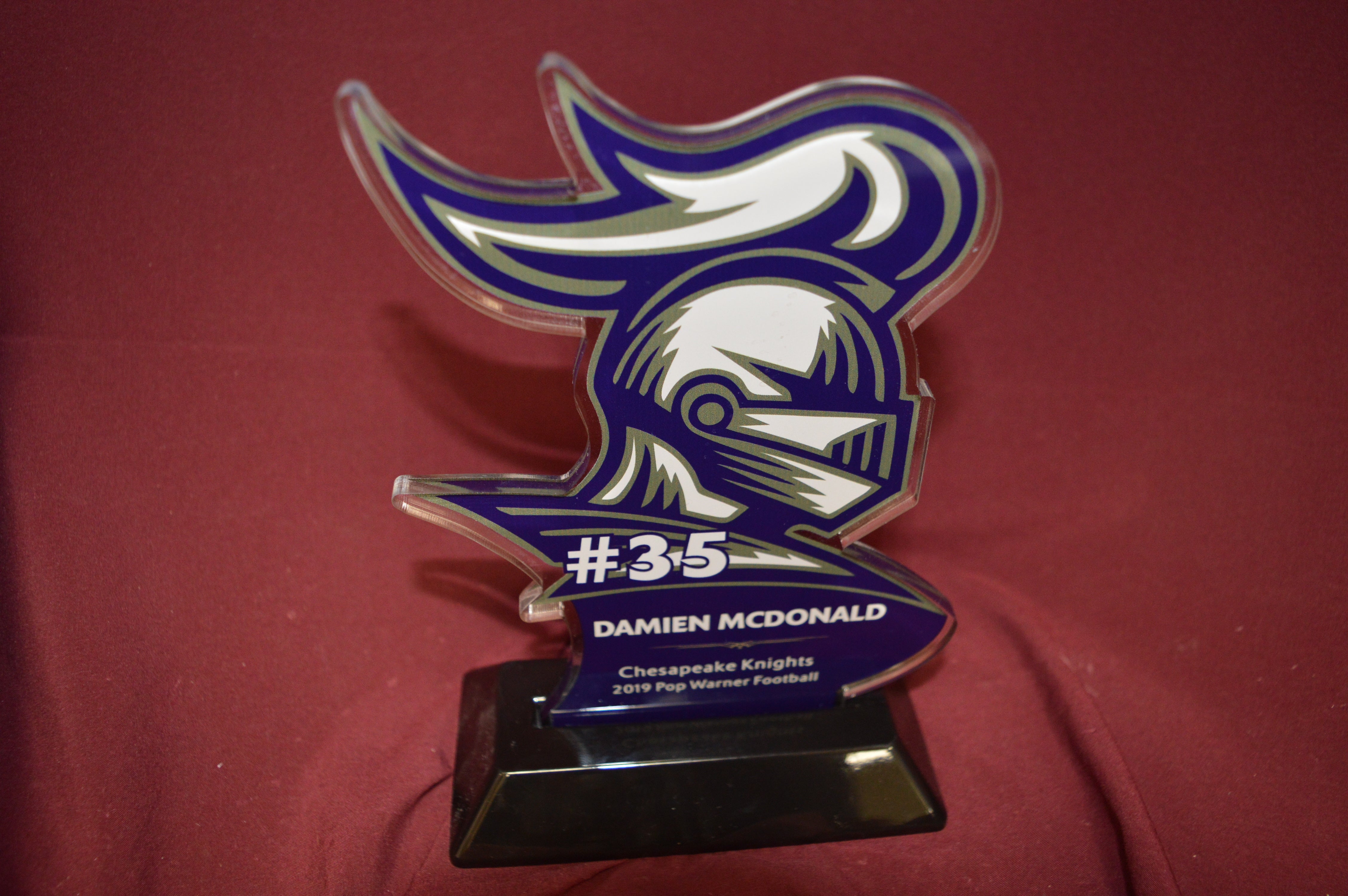 Custom Cut Acrylic Award with Full UV Print on a black snap-in base